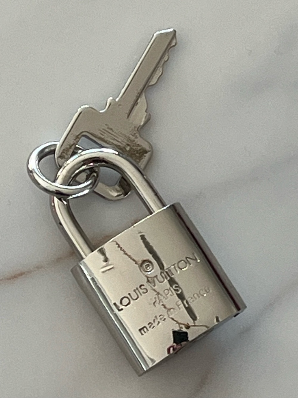 Vintage Hermes “LV” Silver Tone Padlock and Key Set